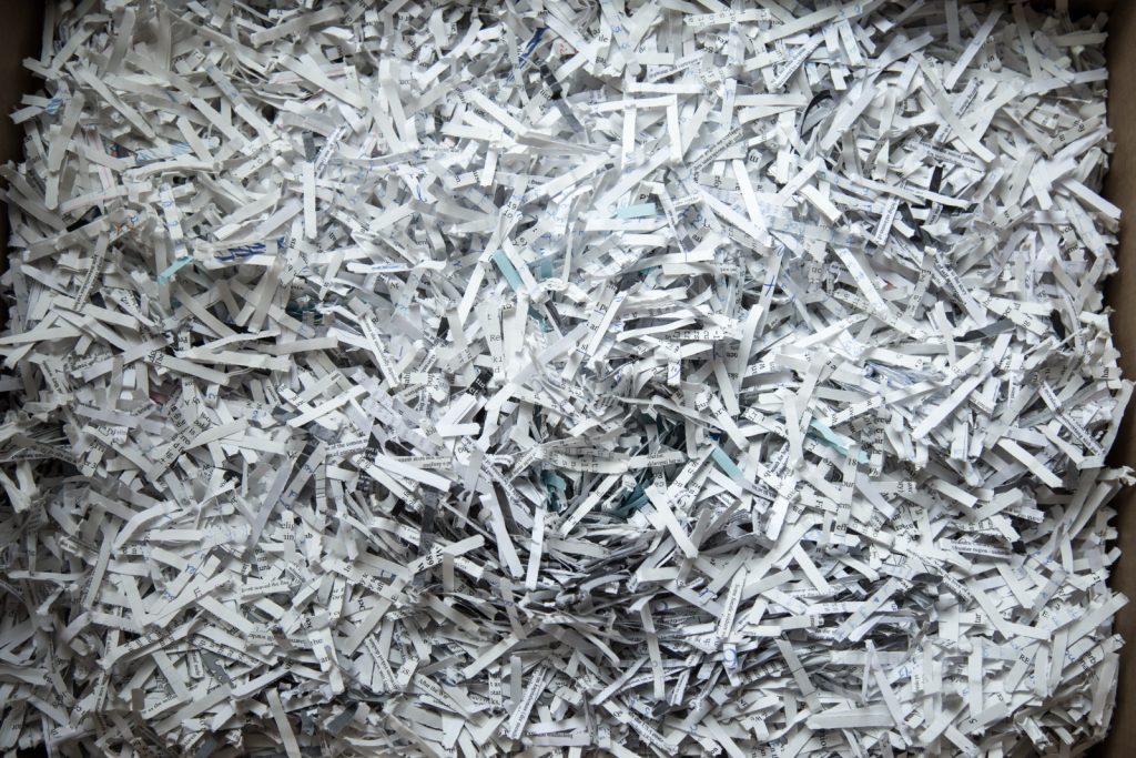 paper shredding close up of shredded paper